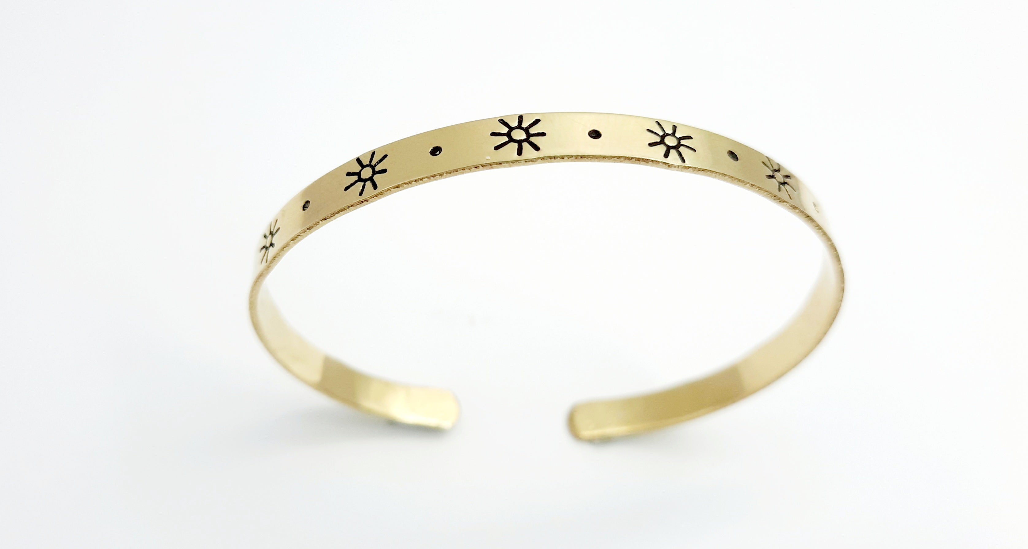 Golden bracelet engraved in Ibiza "suns"